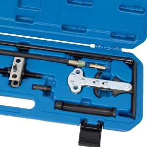Dispozitiv pneumatic universal de comprimat arcuri de supapă cu cadru pivotant